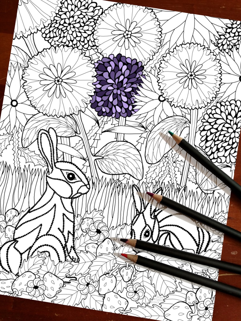 Rabbits in a strawberry field coloring page