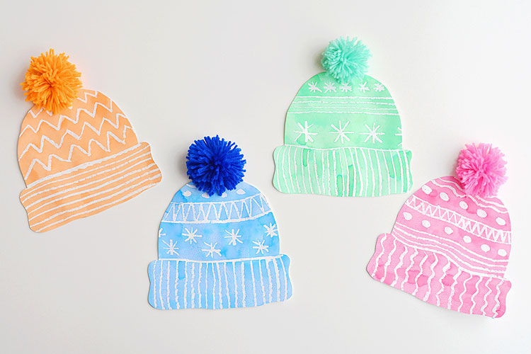 Kids winter hat art project with diy pom poms