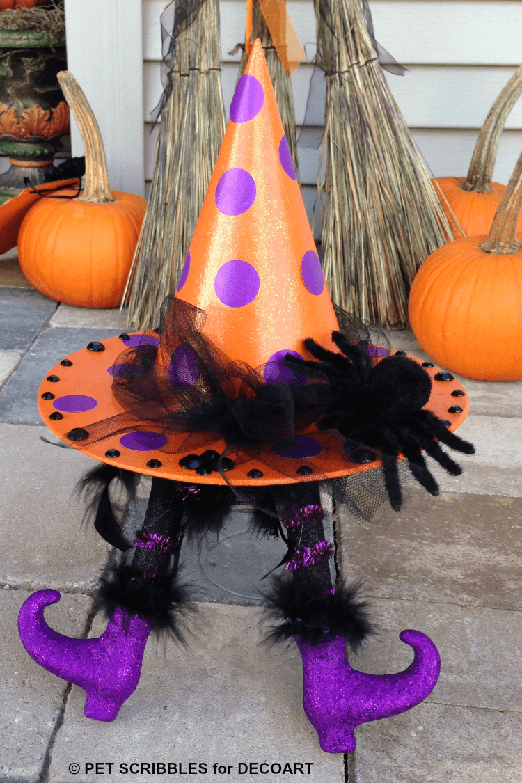 Glitter polka dot witch hat with wicked witch legs