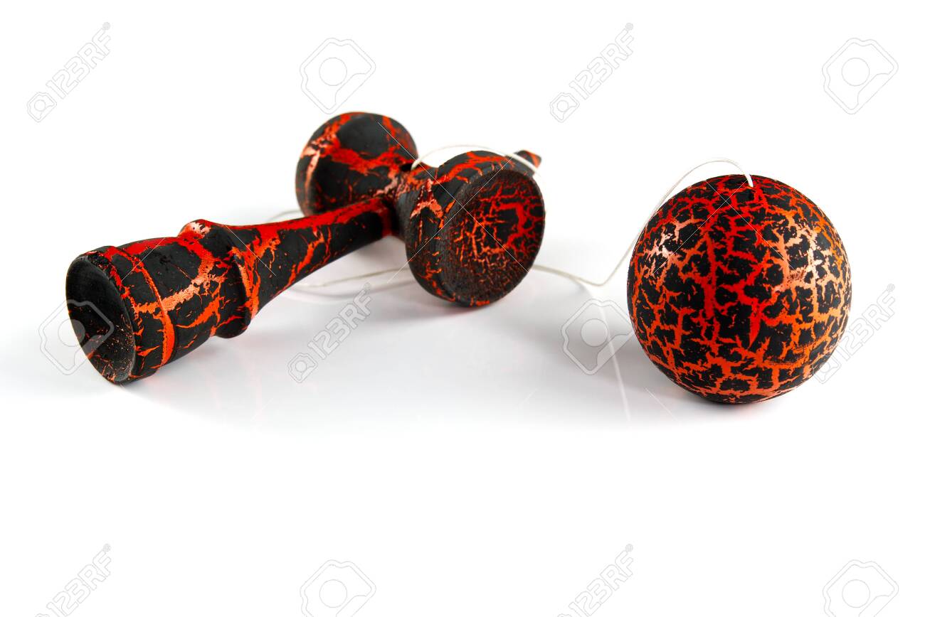 Kendama japanese wooden toy on isolated on white wood toy in black and orange color dragon color stock photo picture and royalty free image image
