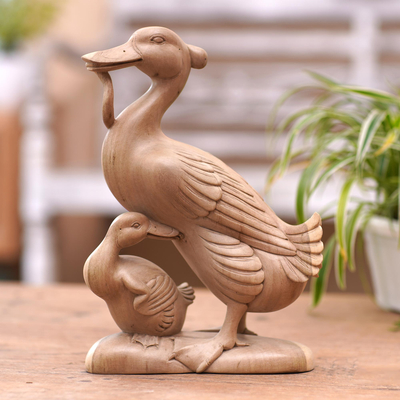 Mother and child hibiscus wood duck sculpture