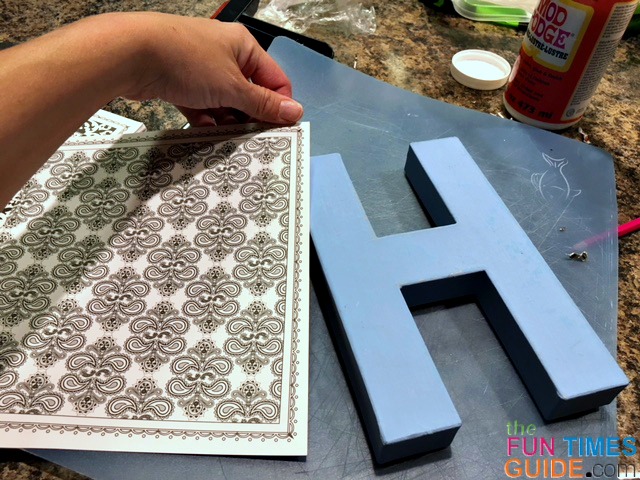 Wood letter painting ideas see how i used wooden alphabet letters adult coloring book pages to make fun toddler bedroom wall decor the art and crafts guide