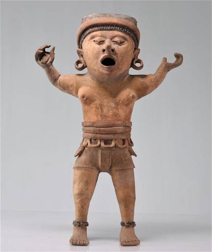 Veracruz cult statue depicting a dignitary of the cult of xipe totec the skinned lord mexico