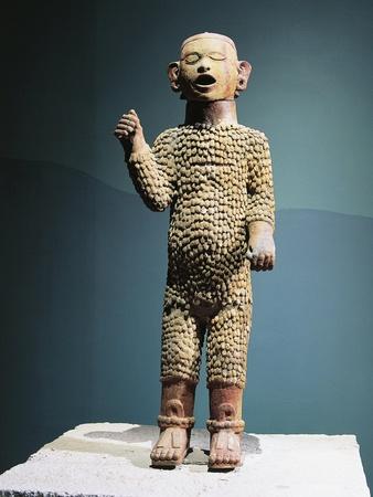 Polychrome ceramic depicting god of eh and spring known as xipe totec our lord the flayed one giclee print