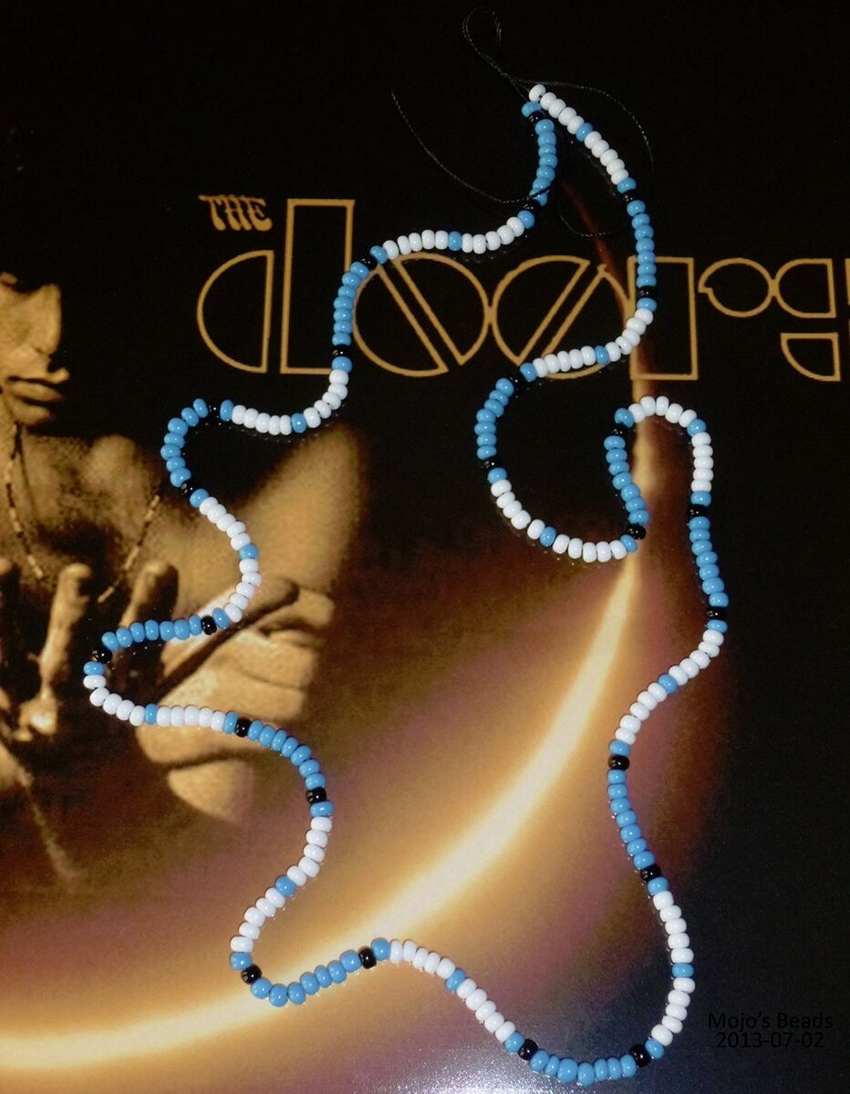 Jimbo turquoise jim morrison doors young lion bra photo shoot beads