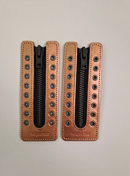 Boot zip inserts tongue ties