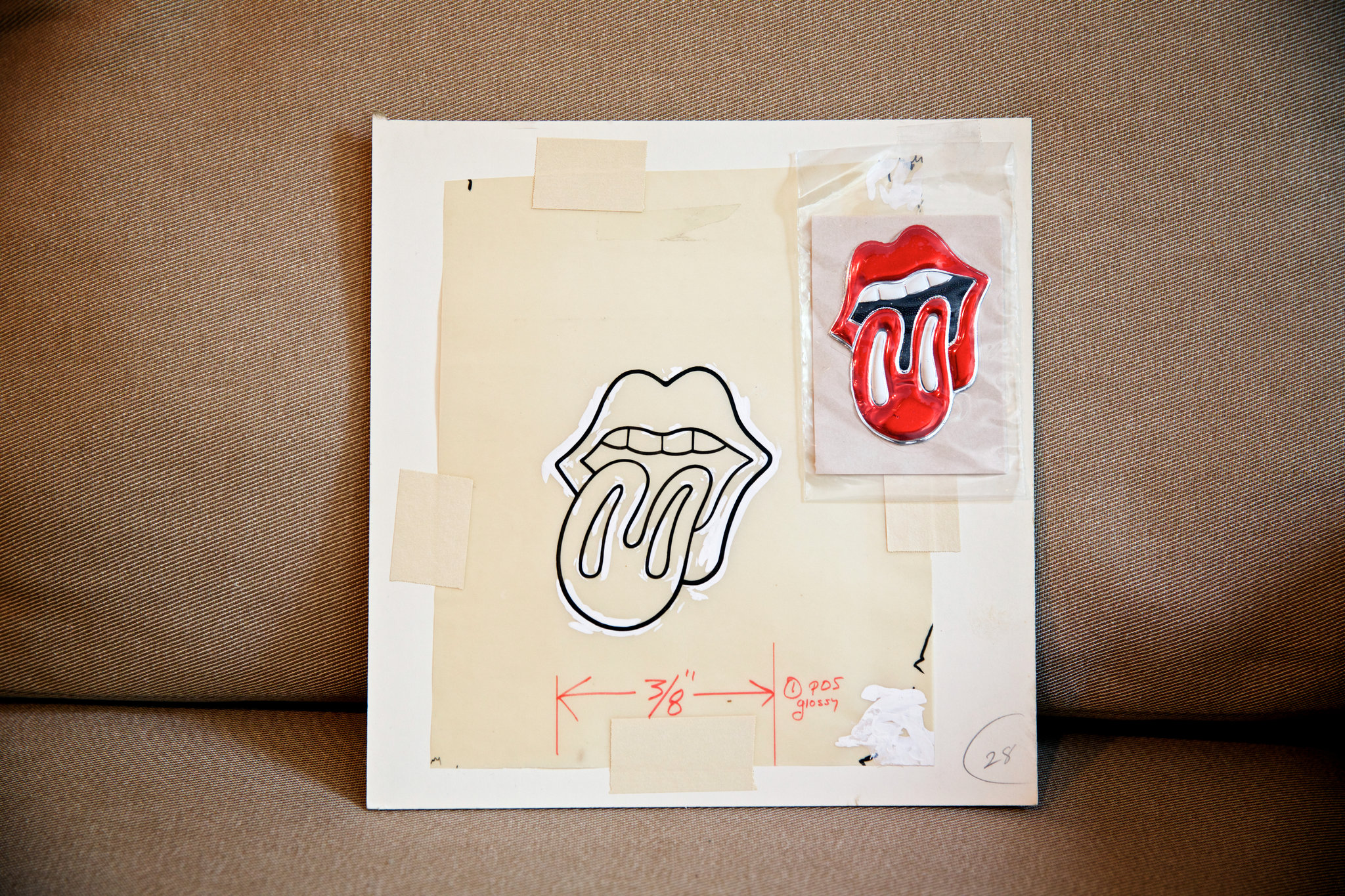 Art of the rolling stones behind that zipper and that tongue